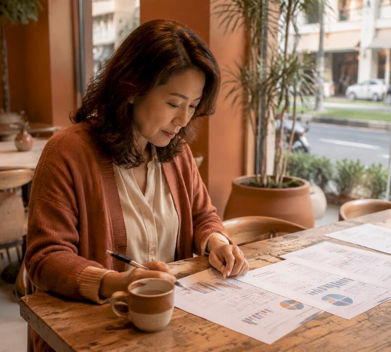 Investor reviewing property market reports