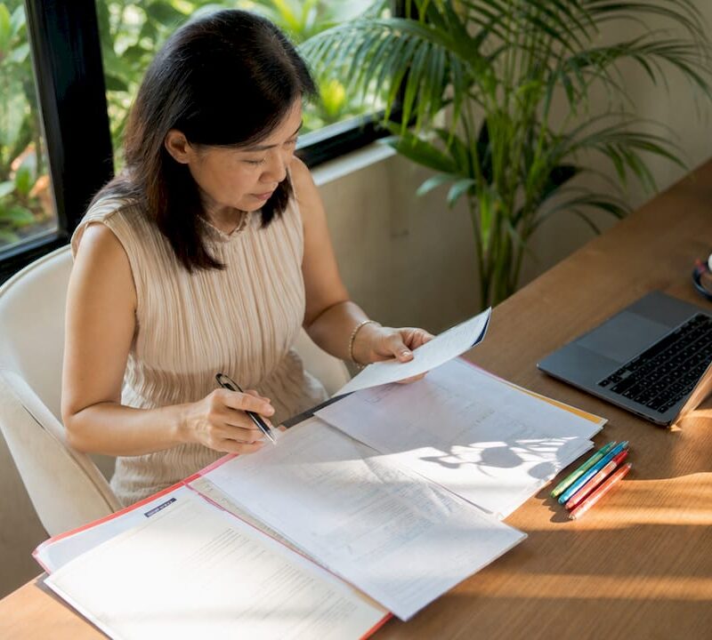 Homebuyer reviewing property title documents
