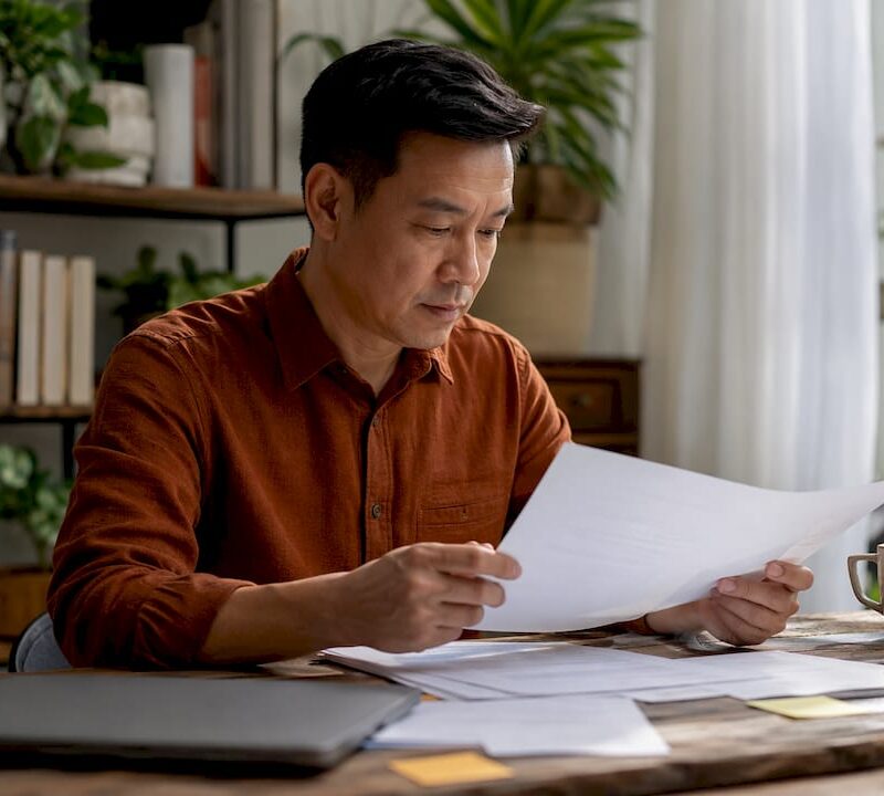 Landlord reviewing tenant retention documents
