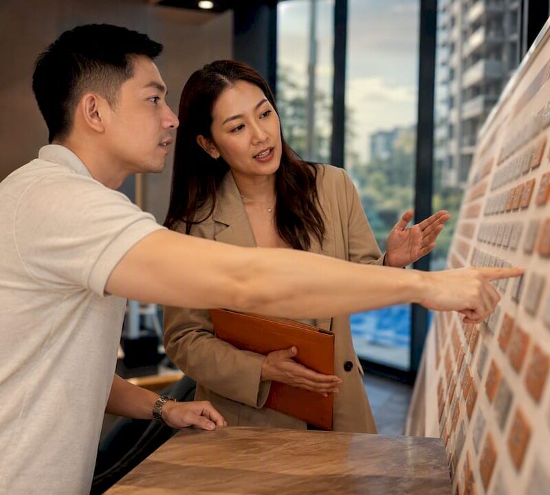 Buyer reviewing new launch unit choices