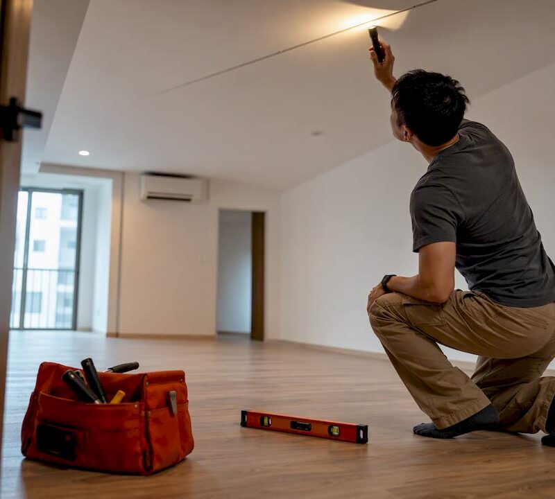 Condo interior being checked for defects