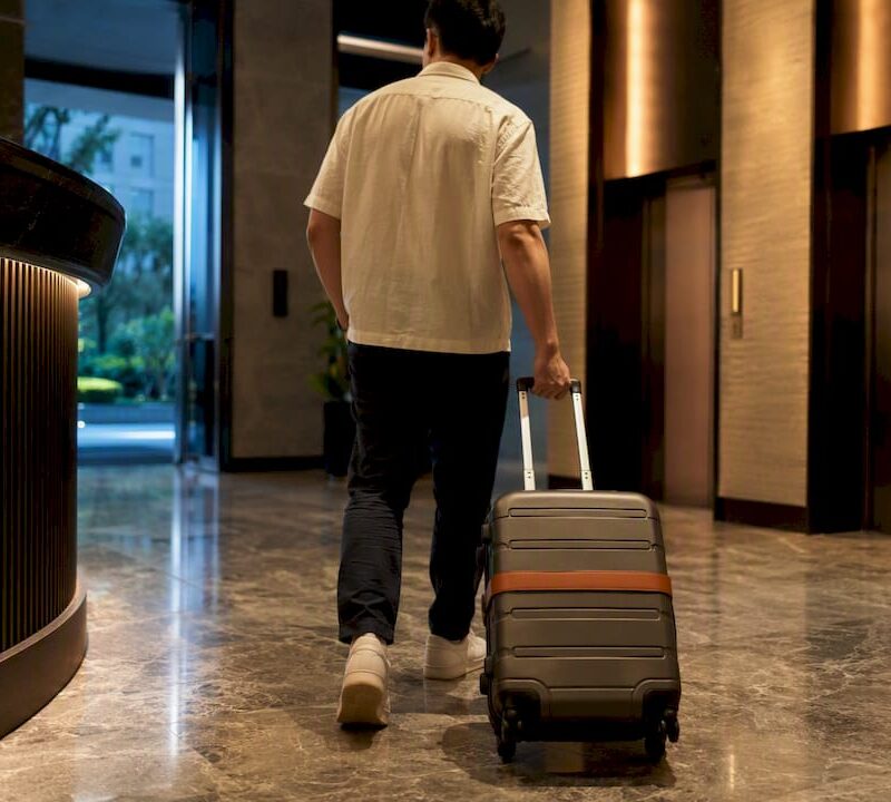 Visitor entering anonymous condominium lobby